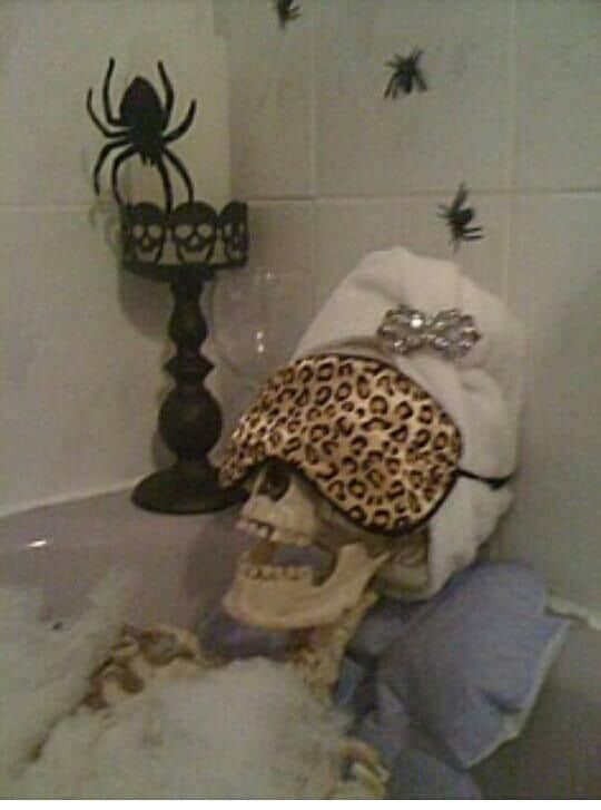 A dollar store skeleton and some of your glamour bath products can create the best Halloween bathroom Decoration