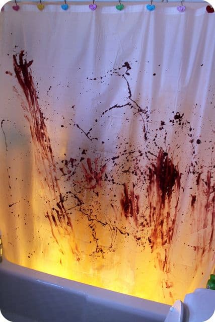 Easy DIY Bloody Halloween Bathroom Decorations- Shower curtain idea