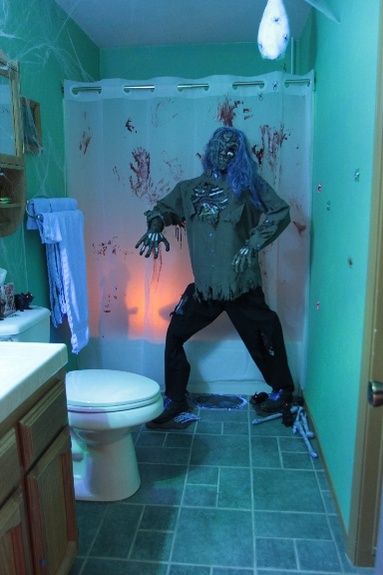 So men can feel someone looking over their shoulder when they're doing their business. Easy DIY Halloween Bathroom decorations that will scare the crap out of them