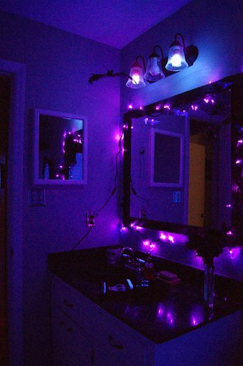 Black lights and string lights combined for Halloween Bathroom Decorations that will scare the shit out of them