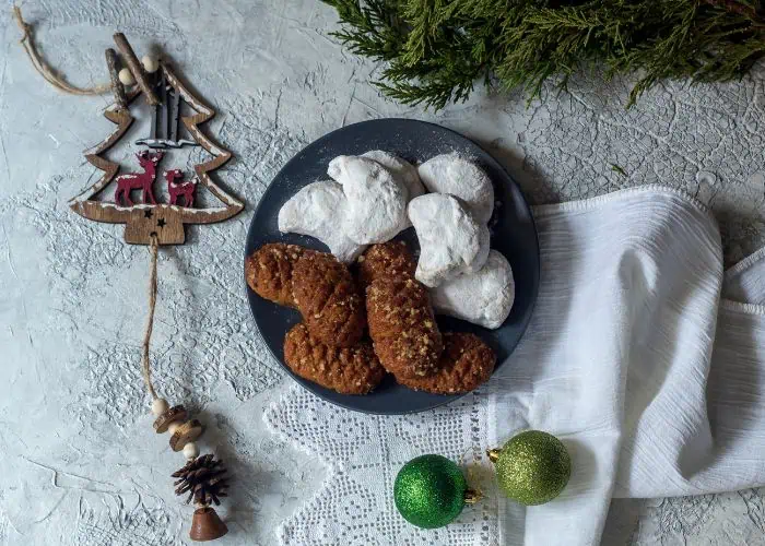 Greek powdered sugar and Melomakarona Christmas cookies