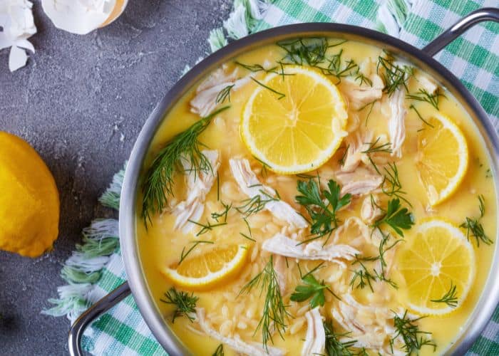 Lemon chicken Greek Easter soup in a pot