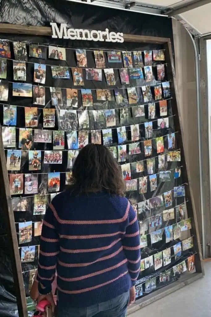 Graduation Party picture display of memories on wire in a wood frame