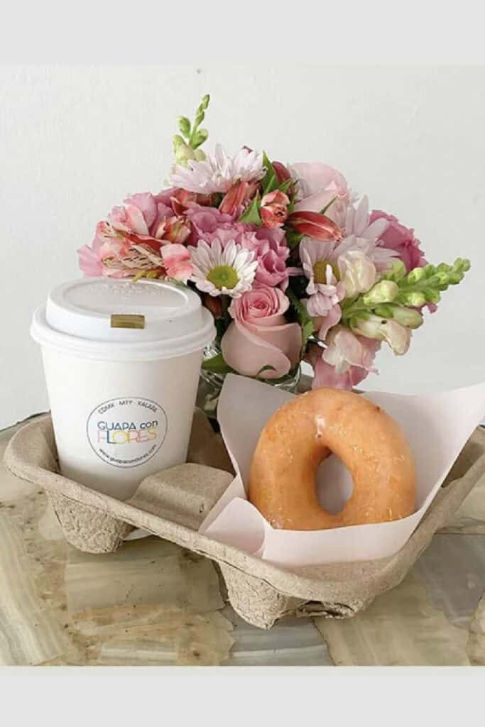 Mother's Cup holder Gift idea with coffee, donut, and flowers.