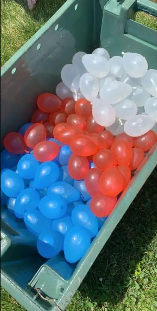 RED WHITE AND WATER BALLOONS FOR 4TH OF JULY PARTY WITH KIDS