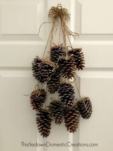 Simple Farmhouse Diy Christmas wreath with pinecones and twine