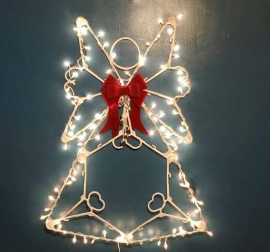 Easy DIY Dollar Store Coat Hanger Christmas Decoration Angel with lights for indoor or outdoor use