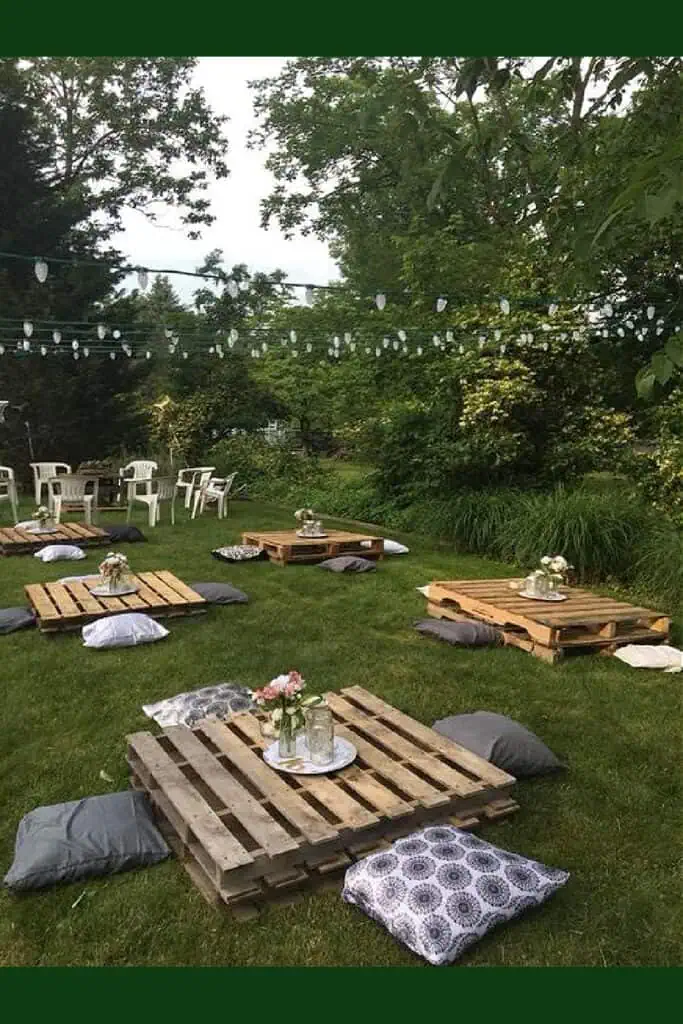 Tables made out of wood pallets for Backyard Graduation Party 