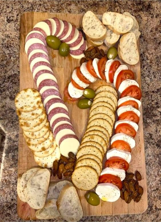 Festive Christmas Candy Cane Meat Cheese snack board appetizer Recipe for party or Holiday 