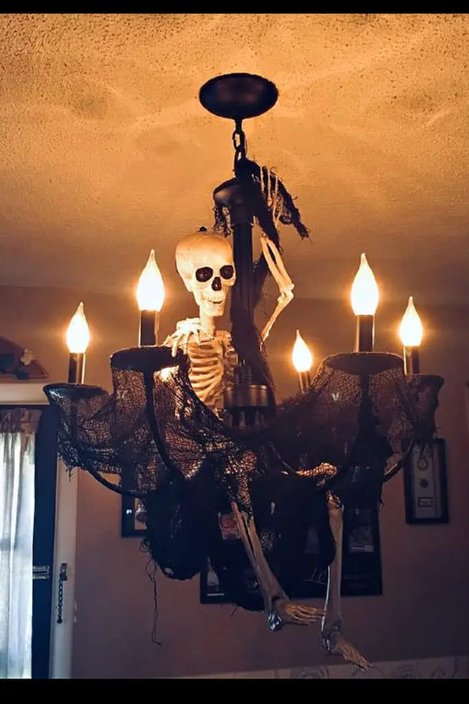 Diy Halloween Decorations using Skeleton for the Chandelier in the home