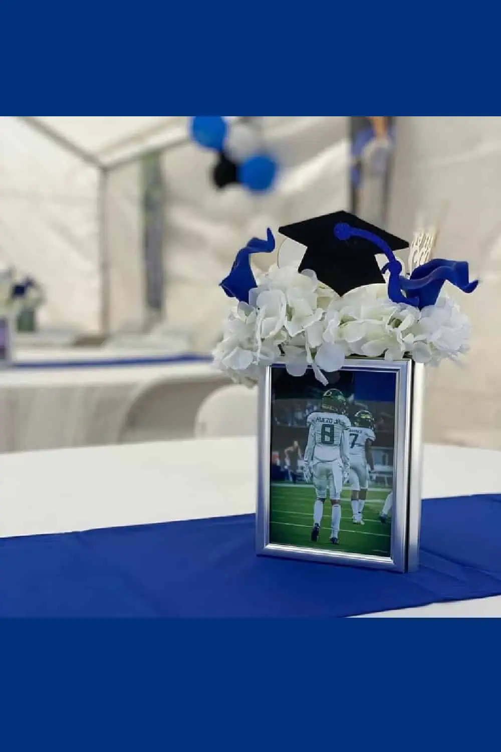 Graduation Party photo centerpiece for boys using 3 picture frames glued together and fake white flowers