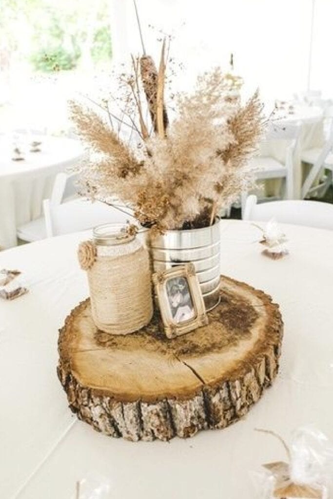 Outdoor Graduation Party Pampas Grass Centerpiece Rustic with picture and wood slice