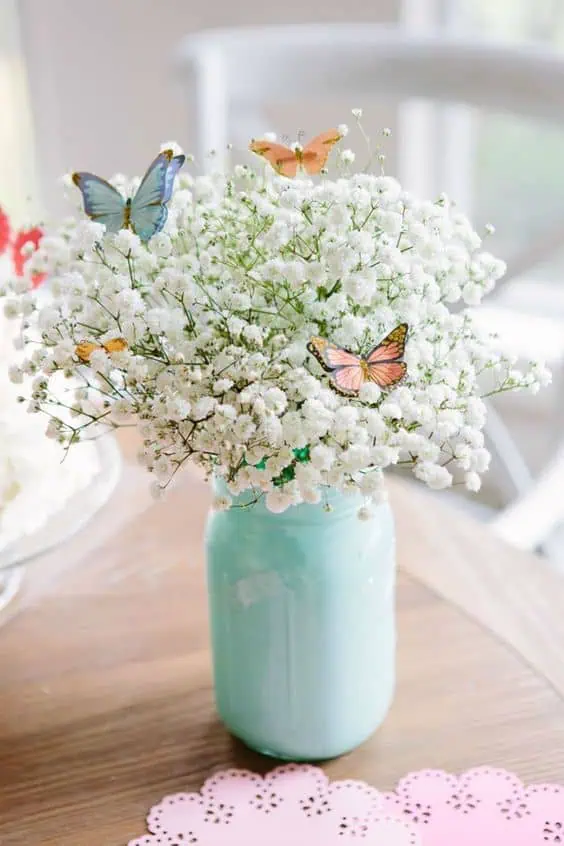 Graduation Party Centerpiece for Girls with Baby's Breath in a Mason Jar with fake butterflies
