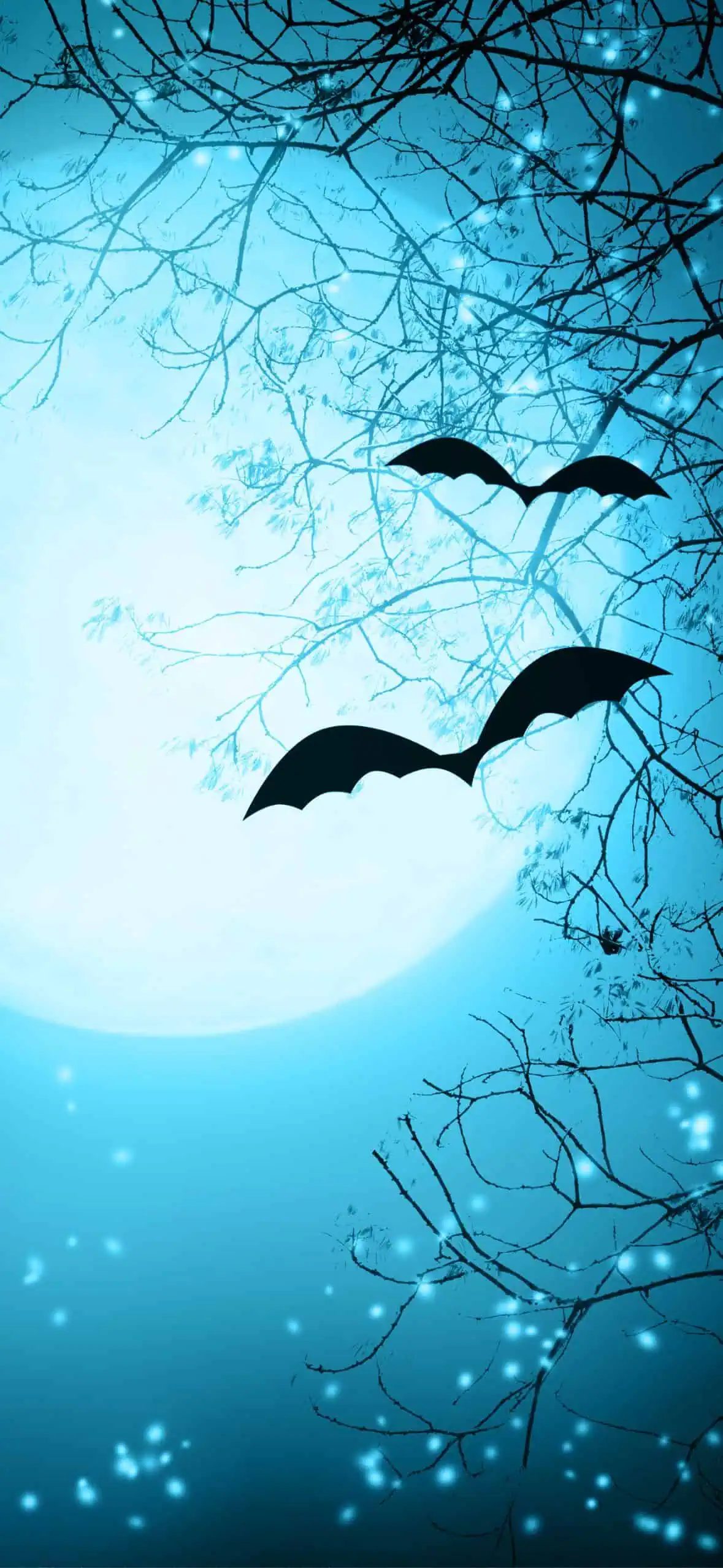 Halloween wallpaper featuring a glowing blue full moon with silhouetted bats flying across tree branches, creating a moody and spooky aesthetic.