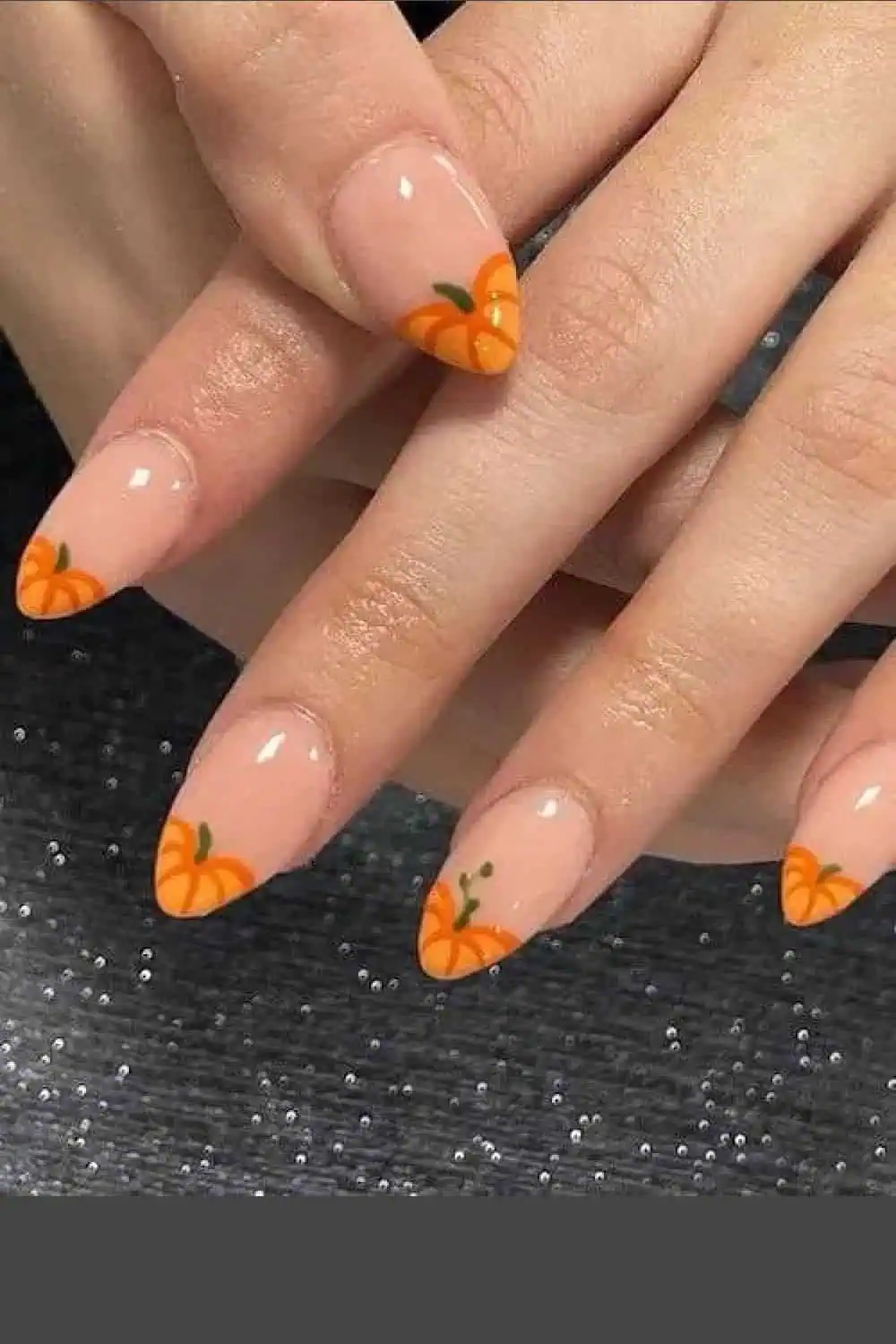 Fall nails with a pumpkin tip