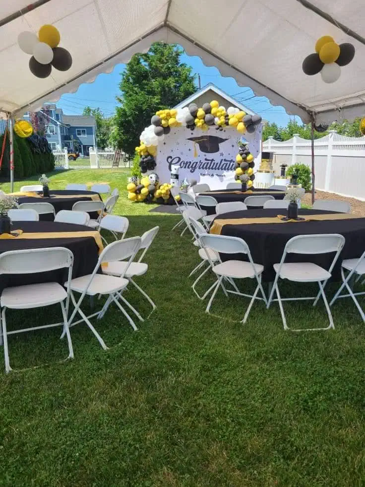 Graduation Party Ideas for boys Balck and Gold white tent seating