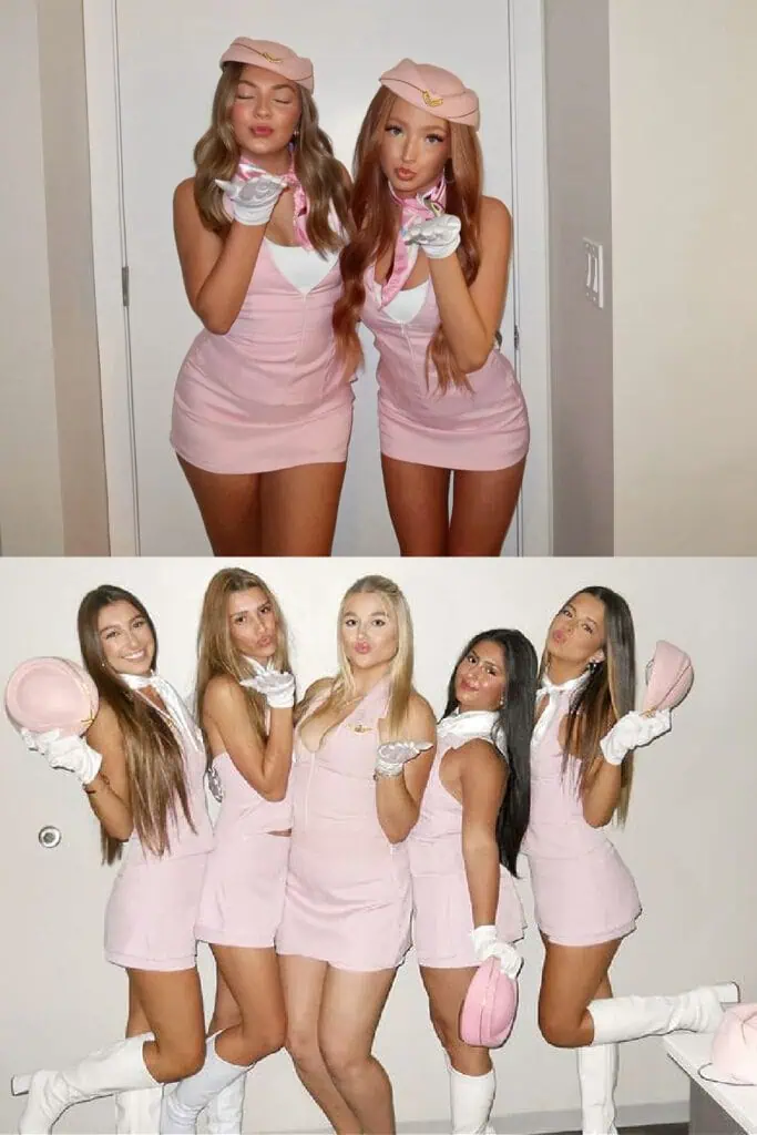 Group of women dressed in pink flight attendant costumes for Halloween. Outfits include matching pink mini dresses, hats, scarves, and white gloves, creating a fun and stylish duo or group costume idea.