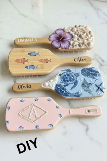 DIY personalized wooden hair brushes with painted designs, seashell decor, fish illustrations, and custom names for unique gift ideas.