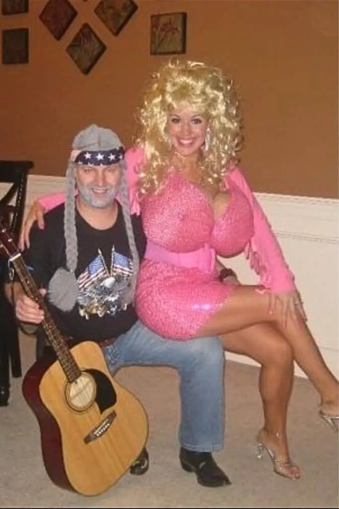 Funny couples Halloween costume featuring Dolly Parton in a sparkly pink dress with blonde wig and Willie Nelson with guitar, beard, and bandana.