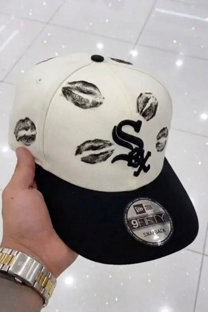 Black and white Chicago White Sox baseball cap with lipstick kiss print design, unique gift idea for him.
