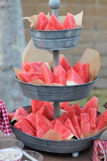 Tiered serving stand for watermelon. Easy 4th of July party ideas.