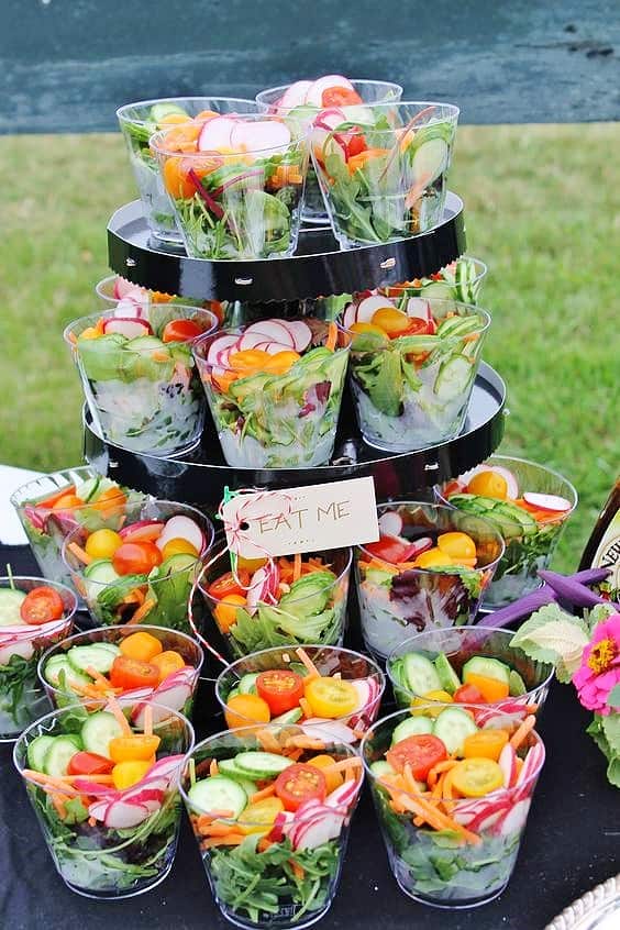 Easy DIY 4th of July Summer Party Food ideas. Serve healthy salad in individual plastic cups for a beautiful display. Perfect for an outdoor wedding too.