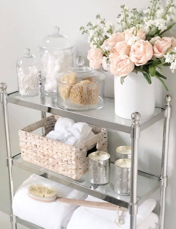 Bathroom shelves control clutter and provide extra storage in a small bathroom