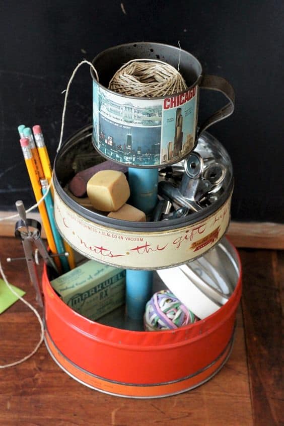 The best easy DIY small Bathroom decor ideas on a budget for apartments. Make dollar store tiered trays to organize counter tops out of old Christmas tins and containers to create more storage.. #Craft