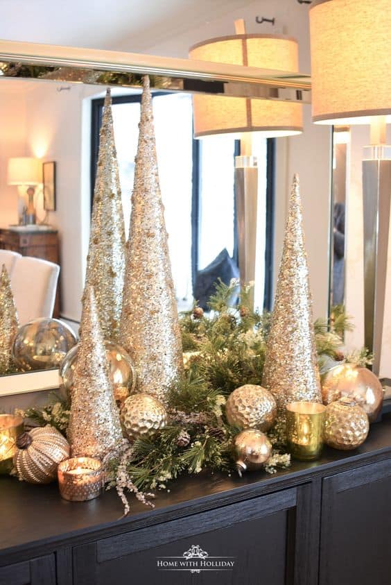 Easy DIY Elegant Silver and Gold Metallic Christmas Cone Decoration Ideas. Perfect for the mantle, the table, or as a tree alternative. Budget friendly decorating for the home, a party or winter wedding.