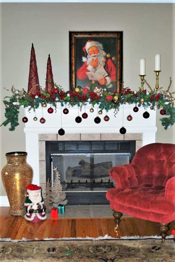 Easy DIY hanging mantel ornaments using ribbon and garland. Elegant Christmas decoration idea for mantle, window, ceiling, or wall. Great budget decor idea for the home, winter wedding, or Christmas party. Dollar store.