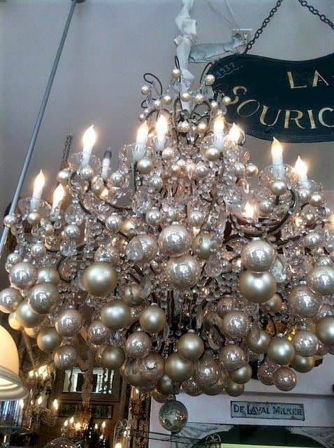 Easy DIY chandelier Christmas decor idea using dollar store ornaments. Elegant Christmas decoration idea for mantle, window, ceiling, or wall. Great budget decor idea for the home, winter wedding, centerpiece, or Christmas party.