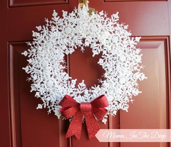 Easy DIY Snowflake wreath. Simple yet beautiful dollar store Christmas craft idea anyone can make, even kids for a party, wedding, or gift.