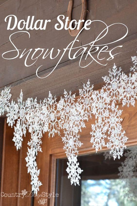 Easy DIY Dollar Store Snowflake garland. Simple yet beautiful dollar store craft idea anyone can make, even kids.