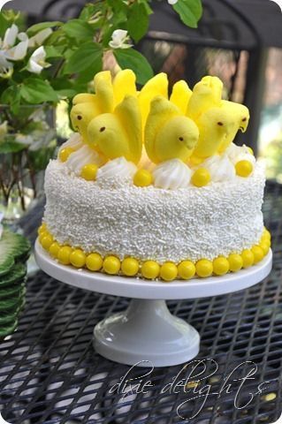 Elegant Cake decorated with Yellow Peeps and candy balls. Easy DIY Easter Dessert Idea. 