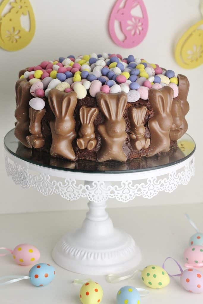  Chocolate cake decorated with chocolate bunnies and candy eggs. Easy DIY Easter Dessert Idea 
