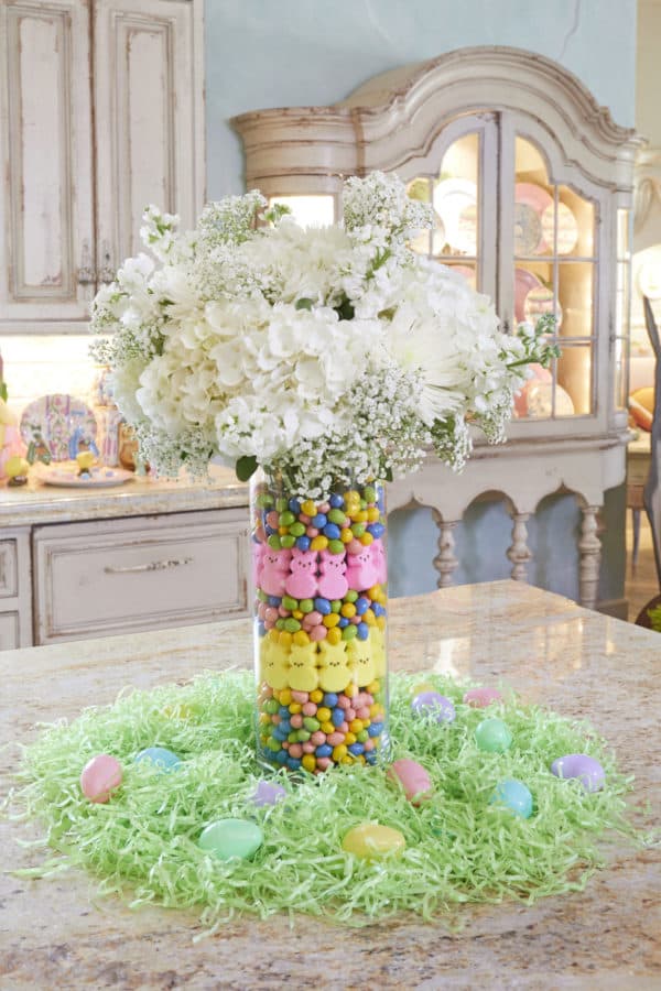 DIY Easter candy filled Vase floral arrangement table setting.