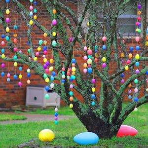 Easy DIY Plastic Easter Egg Garland craft idea for kids. The Best Easy DIY Easter Decoration Ideas. for indoors and outdoors.