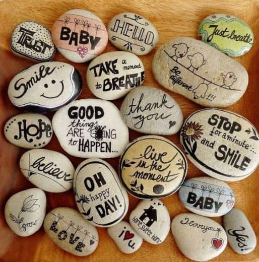 Inspirational words written on rocks with Sharpies. Easy DIY craft gift idea kids can make for Fathers Day