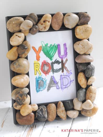 Easy DIY Fathers Day rock frame craft gift kids can make.