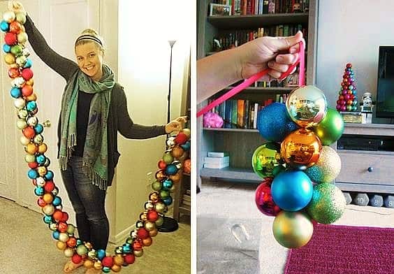 Easy DIY Christmas Garland made of ball ornaments and ribbon. Great to use garland on mantle, on staircase, and doorways. Great holiday decor idea.