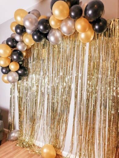 Easy DIY Black and Gold Graduation party photo backdrop booth