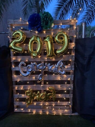 Grad Party Pallet Wood Photobooth with balloons and lights