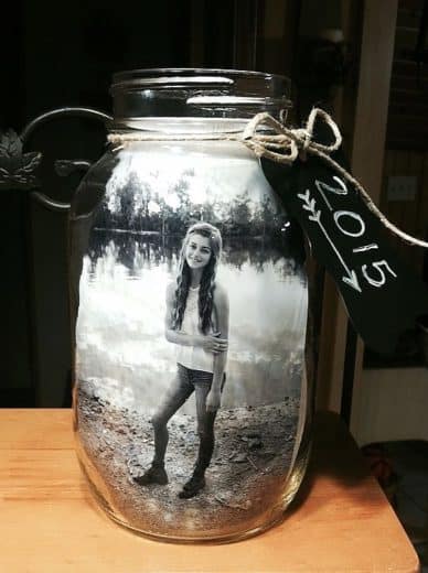 Easy Graduation party picture centerpiece rustic display idea using glass jar for high school and college, boys and girls. Tips and DIY for decorations, pictures, on a budget. #Graduation #GraduationParty #GradParty