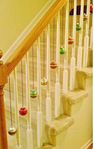 Easy DIY Hanging Ornament Decorations using ribbon. Perfect Christmas decorating idea for the bannister, ceiling, mantle, and wall. Elegant home decor, party decor or winter wedding idea on a budget.