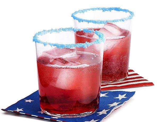 Drinks rimmed with Pop Rocks. Easy DIY 4th of July party ideas for Food and decorations.