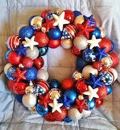 Easy DIY patriotic wreath Decoration idea using Christmas Ornaments. Easy 4th of July party ideas.