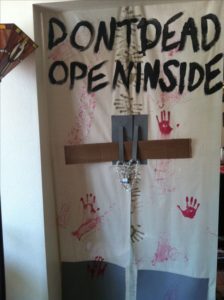 The best, easiest, and most creative Halloween Party Decorations using paper from the show the Walking Dead. Great idea for keeping guests out of bedrooms during a Halloween party.