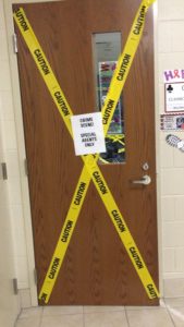 The Best Easy Halloween Party Decorations that will keep Guests out of other rooms using Caution Tape. Great dollar store idea.