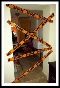 The Best easy Halloween Party Decorations That Will Keep Guests Out of other Rooms using Caution Tape. Great dollar store idea.