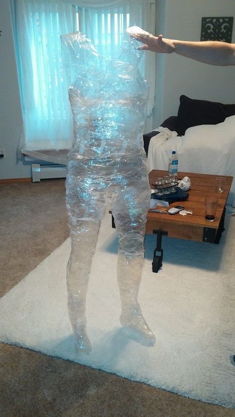 Ghost made out of packing tape for Halloween Decor